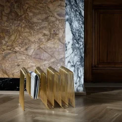Curva newspaper stand, brass