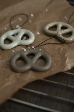 Hanging pretzel decorative ornament, Dust