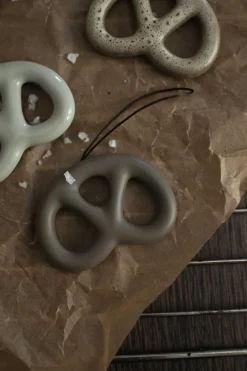 Hanging pretzel decorative ornament, Dust