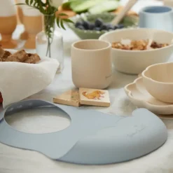 Poppy bib, Pale blue